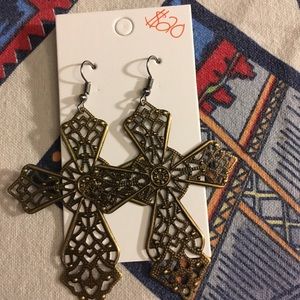 Handcrafted earrings and necklace charms.